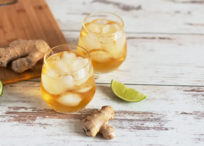 2 cups of ginger bear with fresh lime and ginger